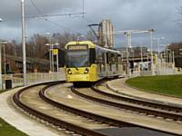 Tram 3030 Departs from the new Westwood stop on it's way to re-join the original route at Werneth towards Didsbury on 27/01/2014. Photo R Clarke
